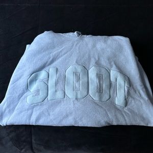 Sofia with an F sweatshirt